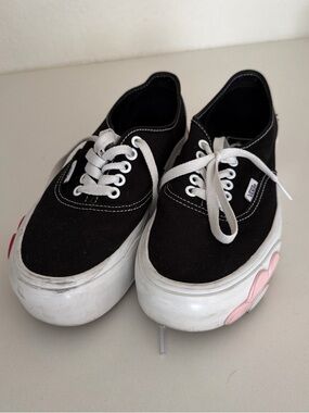 Vans Black Canvas Sneakers with White Soles and Floral Accents